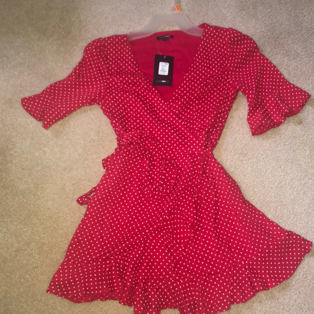 Cherry red polka-dotted wrap dress.